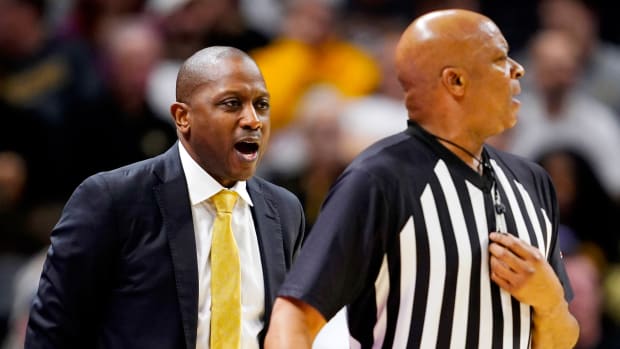 Jan 31, 2024; Columbia, Missouri, USA; Missouri Tigers head coach Dennis Gates talks to referee Olandis Poole during the first half against the Arkansas Razorbacks at Mizzou Arena. Mandatory Credit: Jay Biggerstaff-USA TODAY Sports